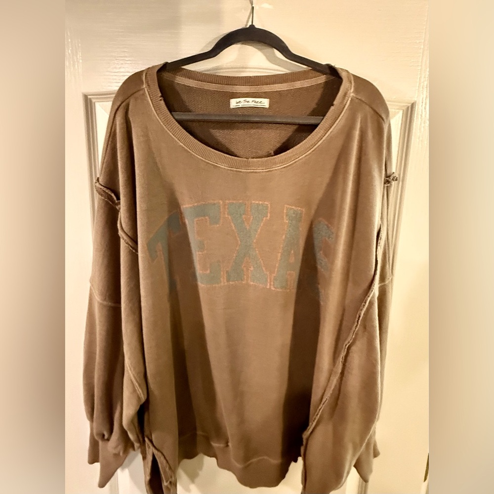 Free people sweatshirt.